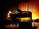 Photo 03 ...... {Click to enlarge in the Central Picture Area} Ricky Ross on stage 