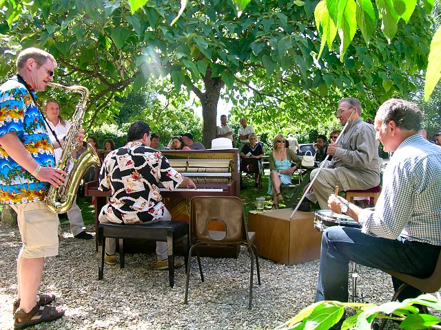 2006 UK Festival : Boogie Woogie Piano playing in the warm summer sunshine at Fontmell Magna, Dorset